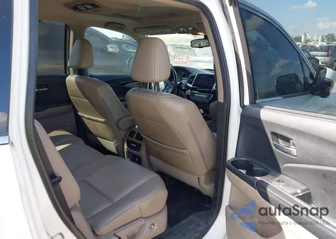 2016 Honda Pilot Touring z USA, uszkodzony, nr VIN 5FNYF5H93GB030459